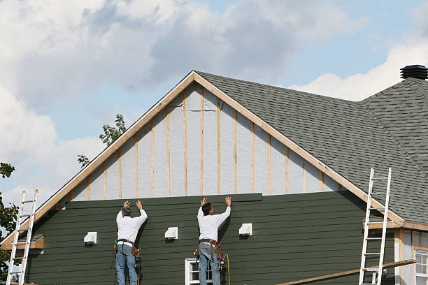 Professional Siding Installation technician working in Grand River, OH